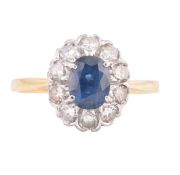 18CT GOLD SAPPHIRE & DIAMOND CLUSTER RING