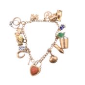 9CT GOLD CHARM BRACELET