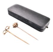 TWO CASED 19T CENTURY STICK LAPEL PINS