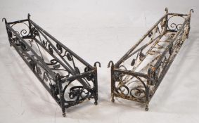 TWO EARLY 20TH CENTURY WROUGHT METAL PLANTERS