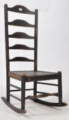 19TH CENTURY NORTH COUNTRY LADDER BACK ROCKING CHAIR