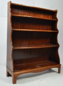 EARLY 20TH CENTURY OAK WATERFALL BOOKCASE