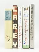 CAREY, PETER. FIVE SIGNED FIRST EDITIONS & PROOF COPIES