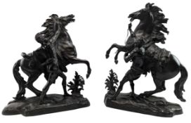 AFTER GUILLAUME COUSTOU (1677-1746) - PAIR OF FRENCH PATINATED BRONZE MARLEY HORSES