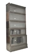 GLOBE WERNICKE, LONDON - EBONISED OAK LAWYERS' STACKING BOOKCASE