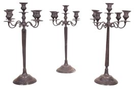 SET OF THREE LARGE SILVER-TONED FIVE BRANCH CANDELABRAS