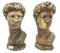 TWO COMPOSITE STONE GARDEN HEADS AFTER MICHELANGELO'S DAVID