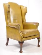 EARLY 20TH CENTURY EDWARDIAN LEATHER WINGBACK ARMCHAIR