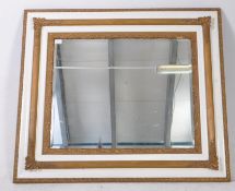 EARLY 20TH CENTURY WHITE AND GILT PAINTED WOODEN WALL MIRROR