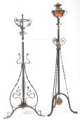 TWO LATE 19TH CENTURY EBONISED OIL LAMP STANDS