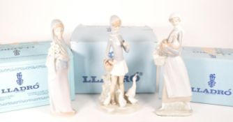 LLADRO - THREE LATE 20TH CENTURY PORCELAIN LADY FIGURES