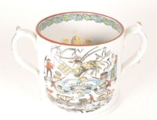 STAFFORDSHIRE 19TH CENTURY TWIN HANDLED POTTERY MUG