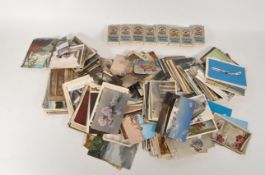 COLLECTION OF 20TH CENTURY CIGARETTE CARDS AND POSTCARDS