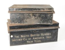 TWO VINTAGE BLACK PAINTED METAL HANDLED TRUNK CASES