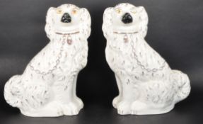 PAIR OF 20TH CENTURY STAFFORDSHIRE POTTERY DOG ORNAMENTS