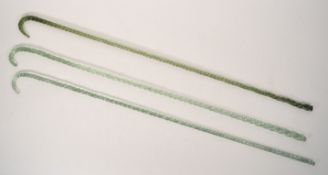 THREE 19TH CENTURY NAILSEA TWISTED GLASS WALKING STICKS