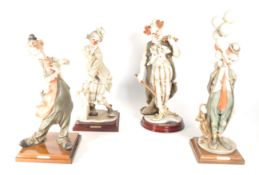 FOUR LATE 20TH CENTURY CAPODIMONTE GIUSEPPE ARMANI RESIN CLOWN FIGURES