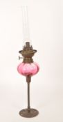 EARLY 20TH CENTUIRY CRANBERRY MOUNTABLE OIL LAMP