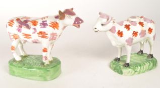 TWO 19TH CENTURY STAFFORDSHIRE PEARLWARE COW CREAMERS