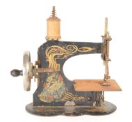 GERMAN 20TH CENTURY TIN CHILD'S TOY SEWING MACHINE