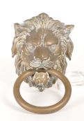 EARLY 20TH CENTURY BRASS LION'S HEAD DOOR KNOCKER