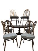 ERCOL - BEECH AND ELM DINING TABLE AND SIX CHAIRS