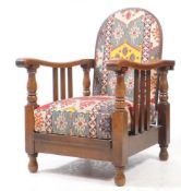 EARLY 20TH CENTURY ARTS AND CRAFTS MORRIS STYLE UPHOLSTERED ARMCHAIR