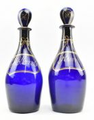PAIR OF 19TH CENTURY BRISTOL BLUE GLASS RUM & HOLLANDS DECANTERS