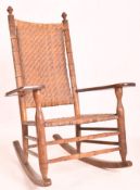 AMERICAN 19TH CENTURY CAVE WOVEN & FAUX BAMBOO ROCKING CHAIR