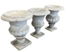 THREE LATE 20TH CENTURY CARVED WHITE MARBLE GARDEN URNS