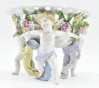 VON SCHIERHOLZ PLAUE - EARLY 20TH CENTURY RETICULATED PORCELAIN BASKET WITH CHERUBS