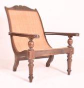EARLY 20TH CENTURY MAHOGANY FRAMED RATTAN PLANTATION CHAIR