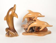 TWO LATE 20TH CENTURY CARVED WOODEN DOLPHIN FIGURES
