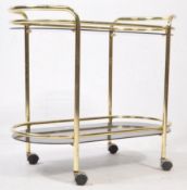 VINTAGE 1960S ITALIAN STYLE BRASS AND SMOKED GLASS TEA TROLLEY