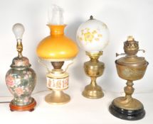 COLLECTION OF FOUR VINTAGE 20TH CENTURY OIL LAMPS