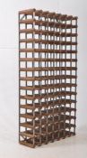 A FREE STANDING LARGE WINE / BOTTLE RACK