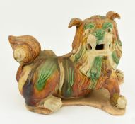 A SANCAI GLAZED POTTERY LION 三彩狮子