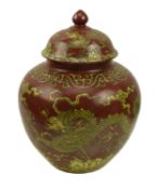 A RED GROUND YELLOW ENAMELLED LIDDED JAR 红底黄彩云龙纹