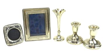 FIVE HALLMARKED SILVER ITEMS INCLUDING VASE & PHOTO FRAMES