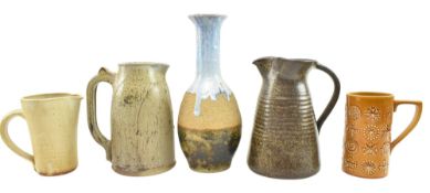 FIVE STUDIO POTTERY STONEWARE & CERAMIC EWER JUGS & A VASE