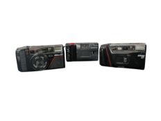 THREE VINTAGE LATE 20TH CENTURY COMPACT 35MM CAMERAS