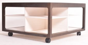 VINTAGE EBONISED AND WHITE TWO TIER REVOLVING COFFEE TABLE