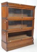 EARLY 20TH CENTURY OAK BARRISTERS STACKING BOOKCASE