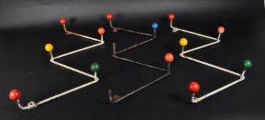 THREE MID CENTURY ATOMIC ZIG - ZAG WALL COAT RACKS