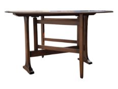 ERCOL FURNITURE - 20TH CENTURY BEECH & ELM DROP LEAF DINING TABLE