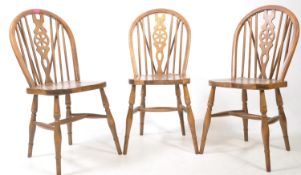 THREE 20TH CENTURY COUNTRY WHEELBACK DINING CHAIRS