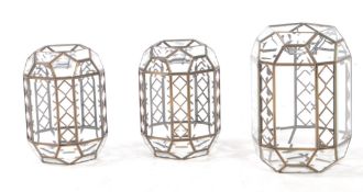 THREE MATCHING GLASS & LATTICE METAL WORK PORCH LANTERNS