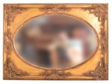 LARGE HOLLYWOOD REGENCY GILT FRAMED MIRROR