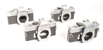 MINOLTA - FOUR VINTAGE 20TH CENTURY 35MM SLR CAMERAS