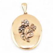 EARLY 20TH CENTURY 9CT GOLD PENDANT LOCKET